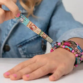 Sticki Rolls Wearable Reusable Sticki Band Mystery Capsule (50 Stickers Inside!) Simple Showcase